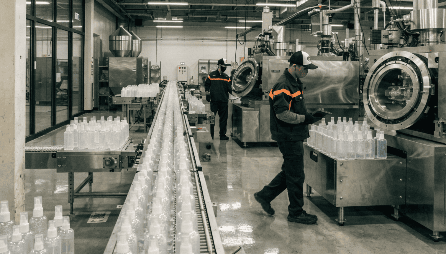 Modern injection molding machines operating in a clean, well-lit plastic production workshop